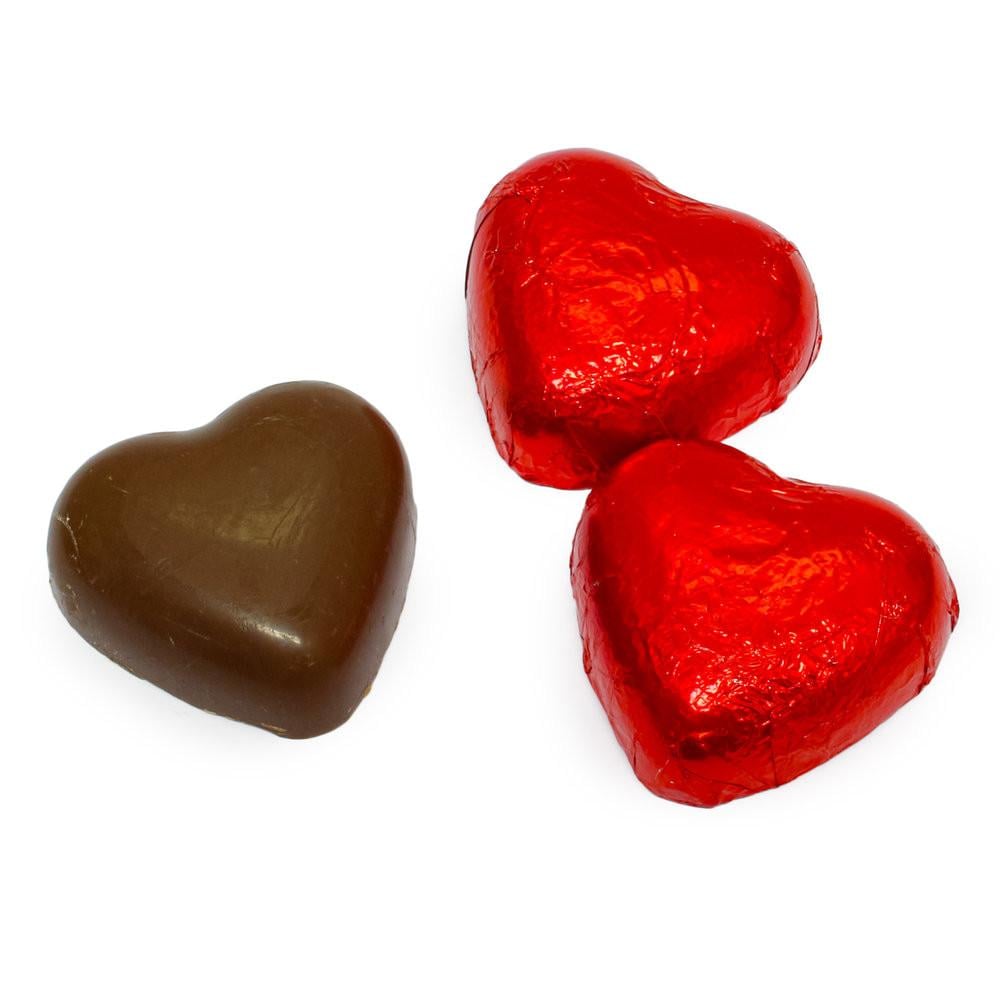 Snoep chocolade hartjes goud en rode hartjes