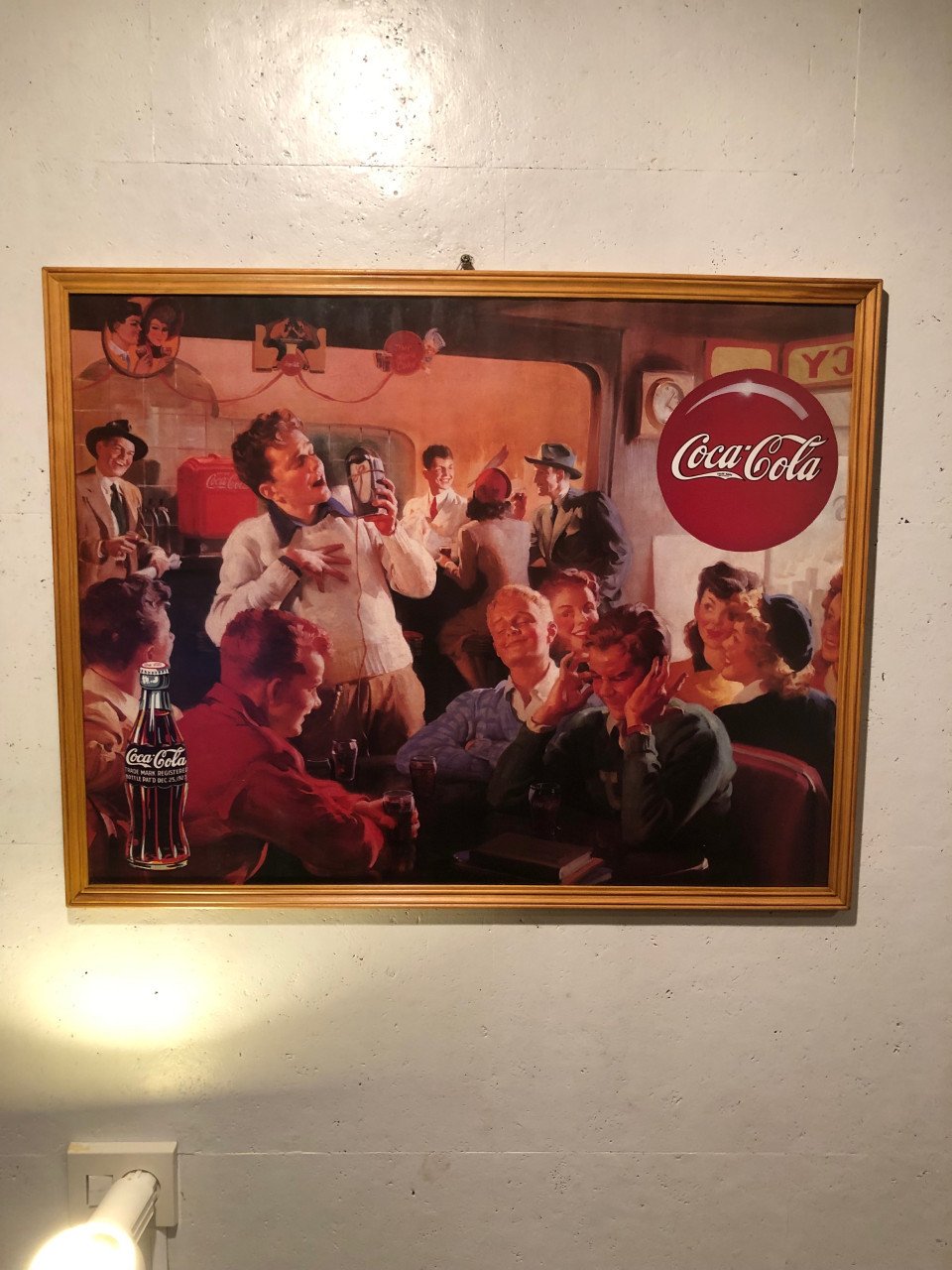 Leuke poster ingelijst achter ontspiegeld.