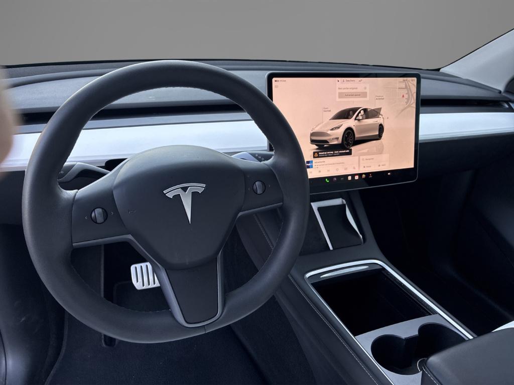 Tesla Model Y performance awd 75 kwh leder | parkeercamera | schuif-kanteld