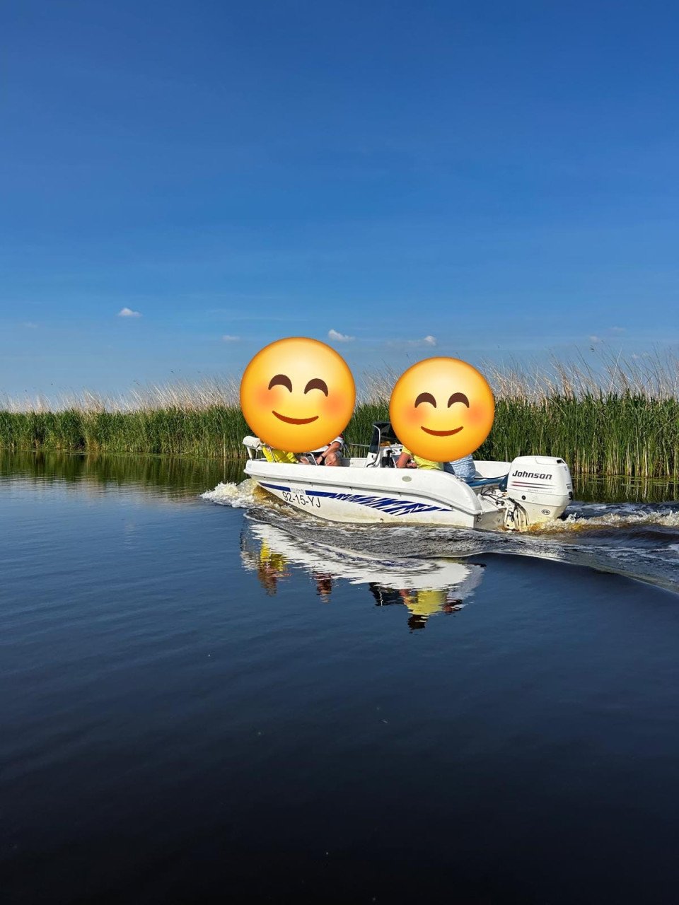 Consoleboot met 60 pk buitenboordmotor en trailer
