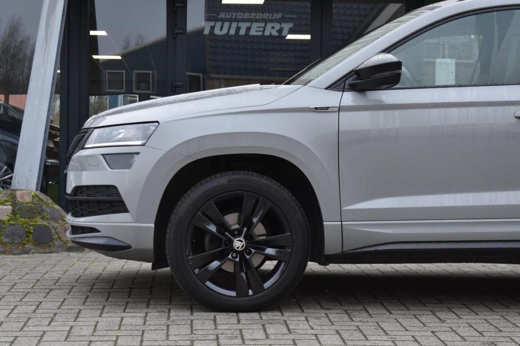 Skoda Karoq 1.5 tsi act sportline | trekhaak | camera | nap | canton | appl