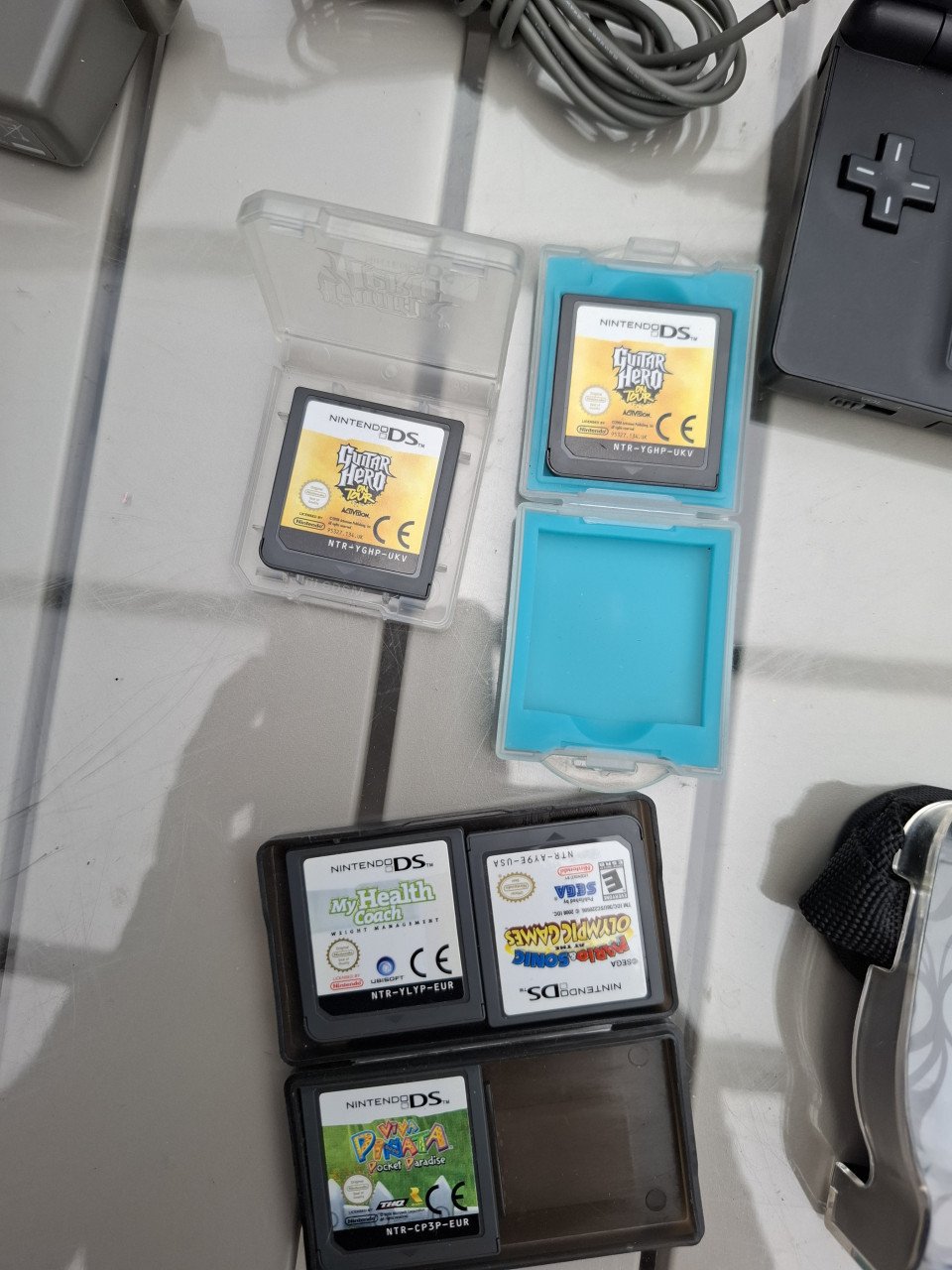 Nentendo DS lite met 5 spelen en toebehoren.