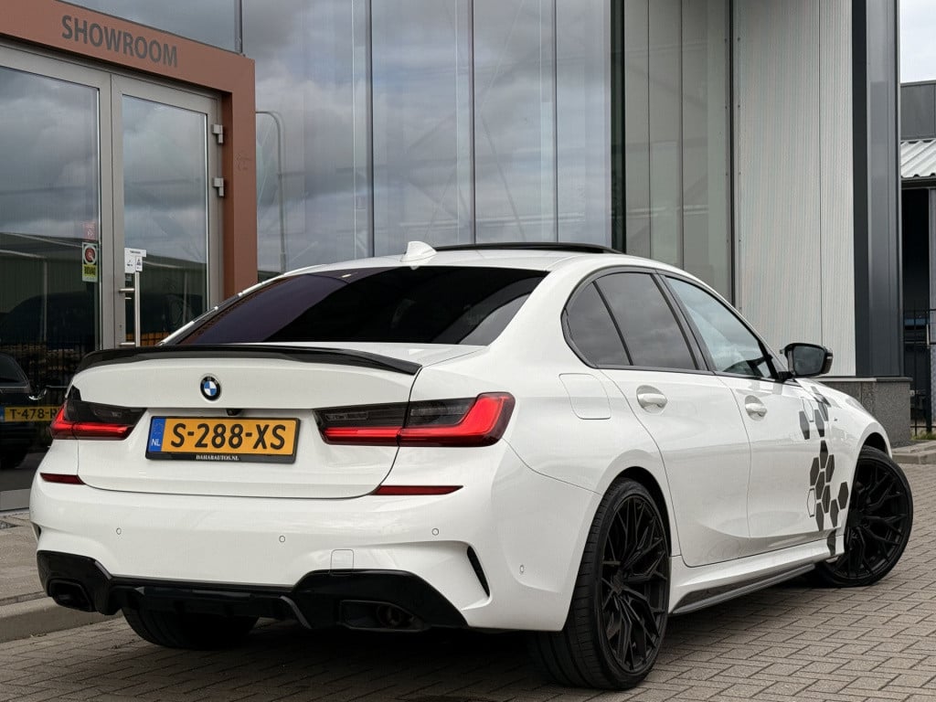 BMW 3-serie 320i m-sport | schuifdak | acc | leder | memory | laser | 20 in