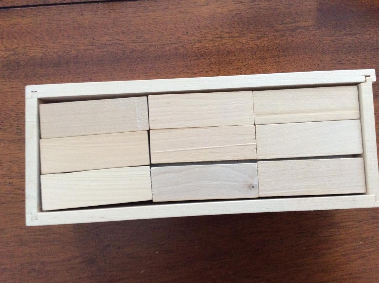 Stapeltoren, zakje verschillende blokken, rechthoekige blokjes, damstenen.