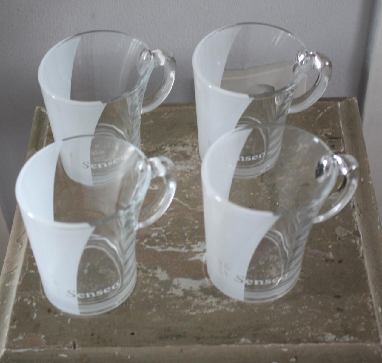 Set van 4 Douwe egberts senseo kopjes.