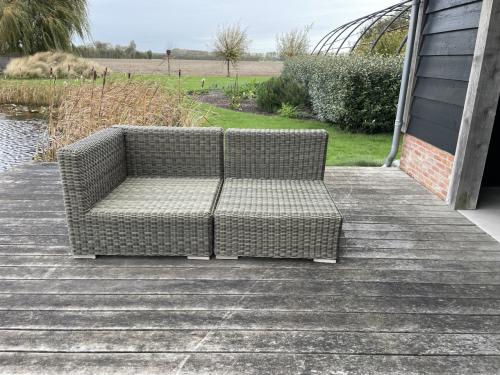 Loungebank van wicker