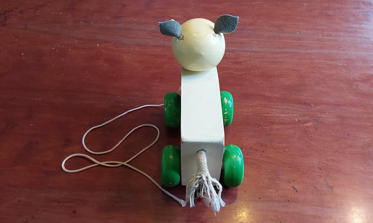 Houten trekspeelgoed koe uit de jaren 50
