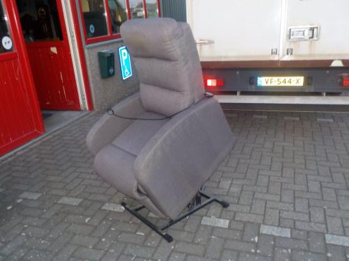 Stoffen elektrische sta-op relex fauteuil in goede staat