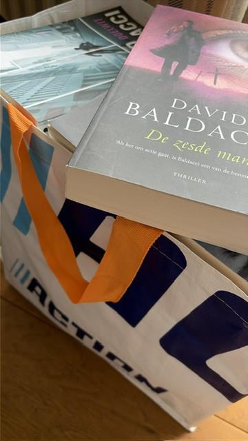 Circa 25 boeken van Baldacci, in goede staat
