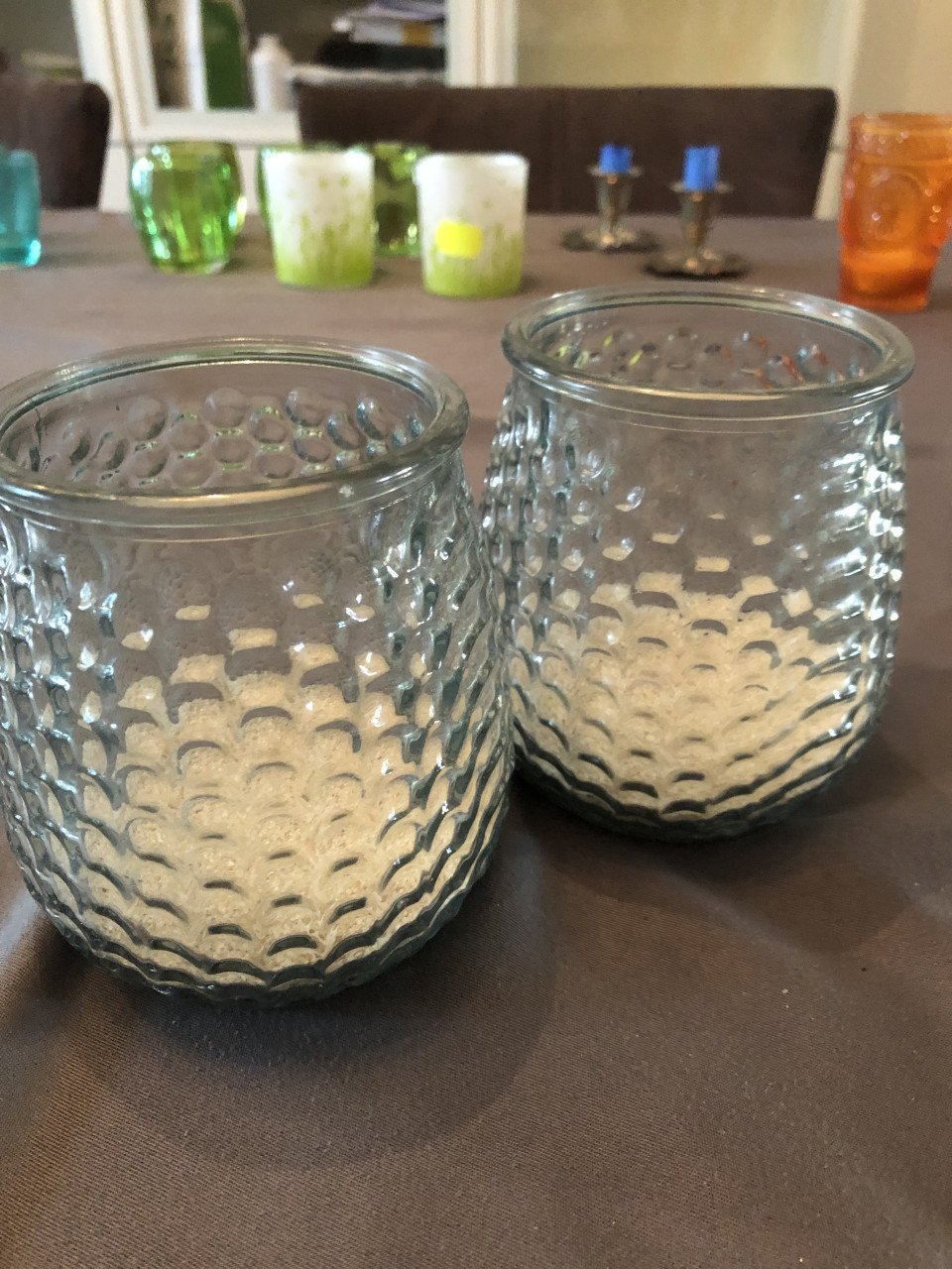 3 oranje waxinelichtjes