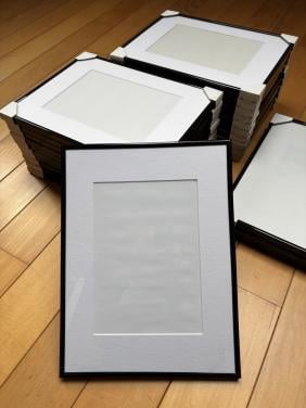 Fotolijsten ( zwart ) met passe-partout ( wit )