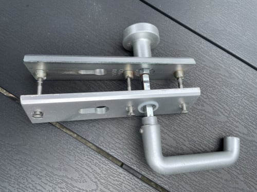 Voordeur sluitplaat met knop