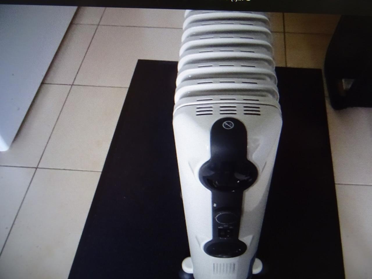 Te koop elektrische verwarming radiator twee standen bijna nieuw