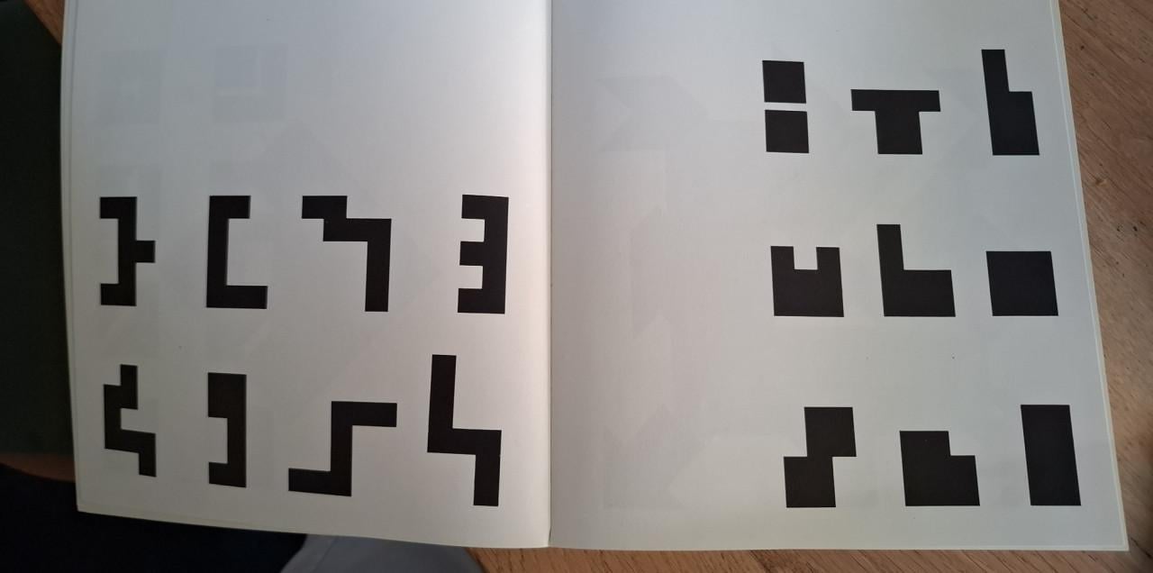 Tangram : het oude Chinese vormenspel, Nederlands en Duits