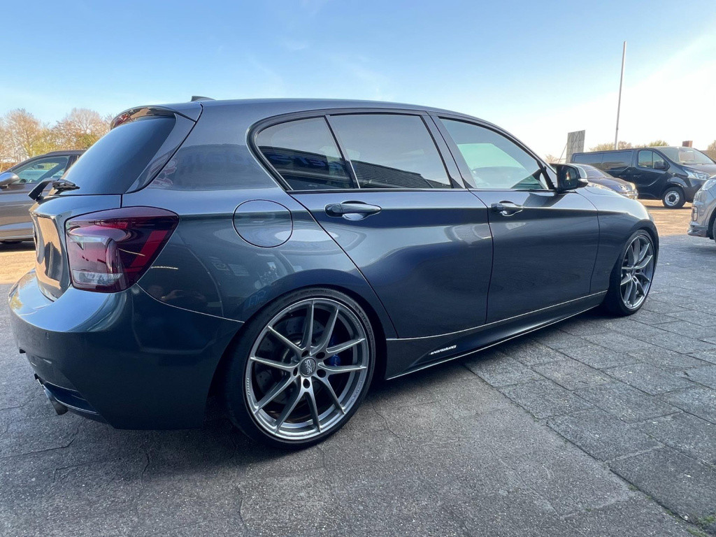 BMW 1 Serie m135i xdrive high executive, customized, stage 2 437 pk!