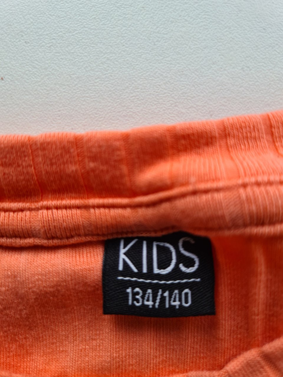 Zalm roze / oranje shirt van Kids  Maat 134-140