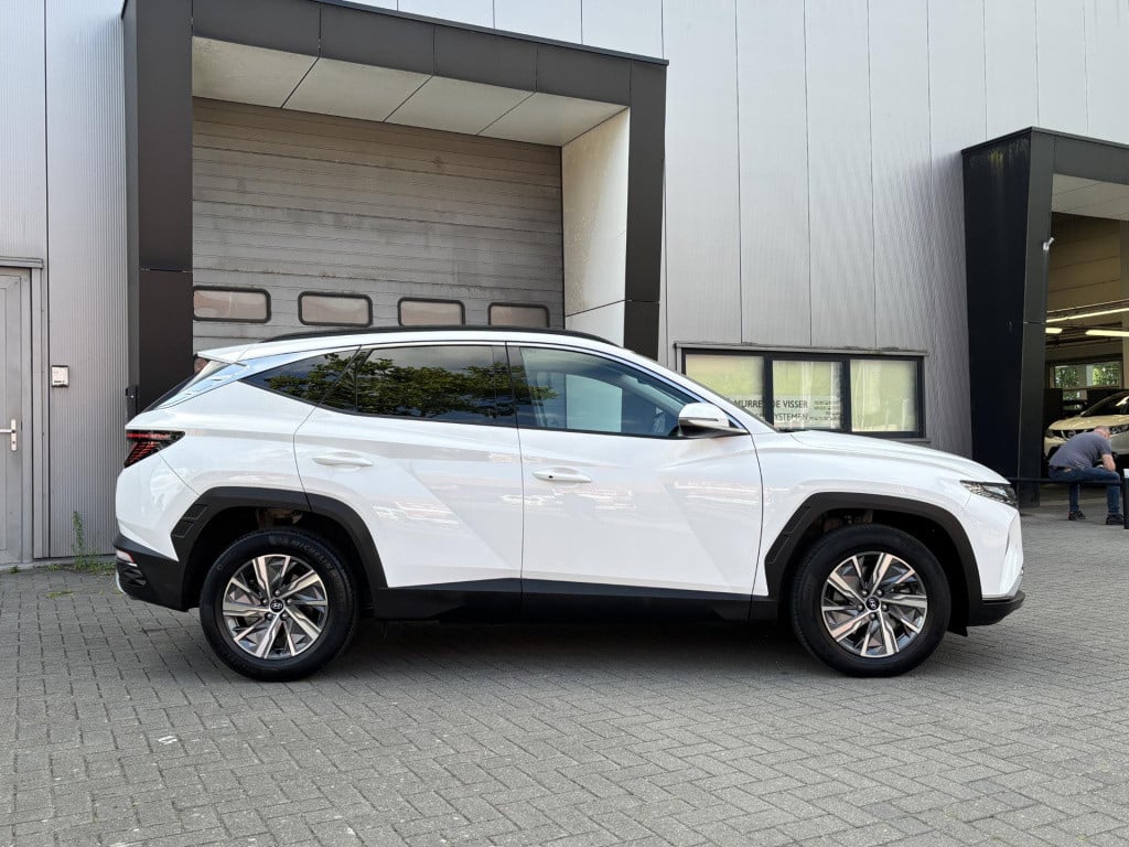 Hyundai Tucson Hybrid 1.6 t-gdi hev comfort smart | navigatie | camera | ap
