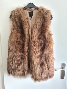 Mooie bruine fake fur lange bodywarmer van Forever21  Maat L