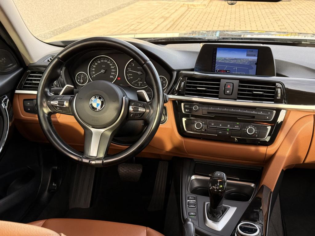 BMW 3-serie 320i high executive | harman/kardon | leder | v + a parkeersens