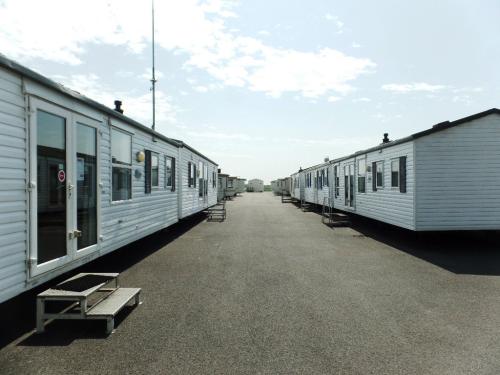 Diverse modellen stacaravans en chalets met middenkamer