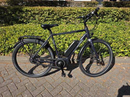 Keurig nette Brinckers elektrische heren fiets met middenmotor