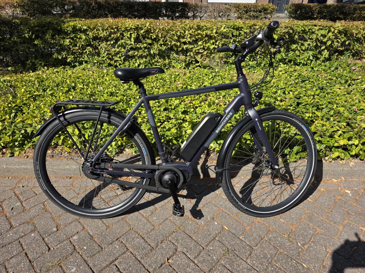 Keurig nette Brinckers elektrische heren fiets met middenmotor