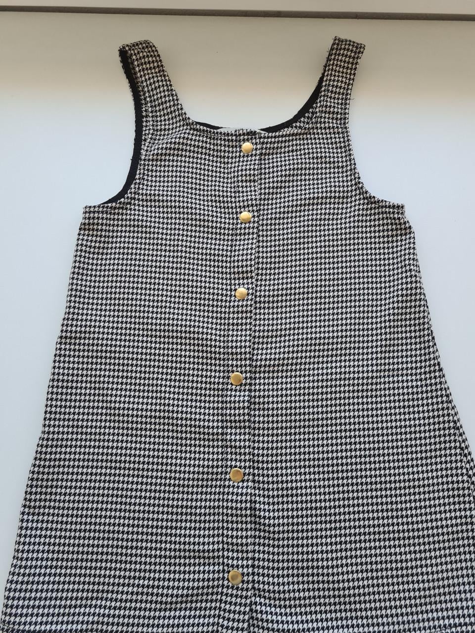 Zwart-wit piede de poule jurkje van H&M Maat 128