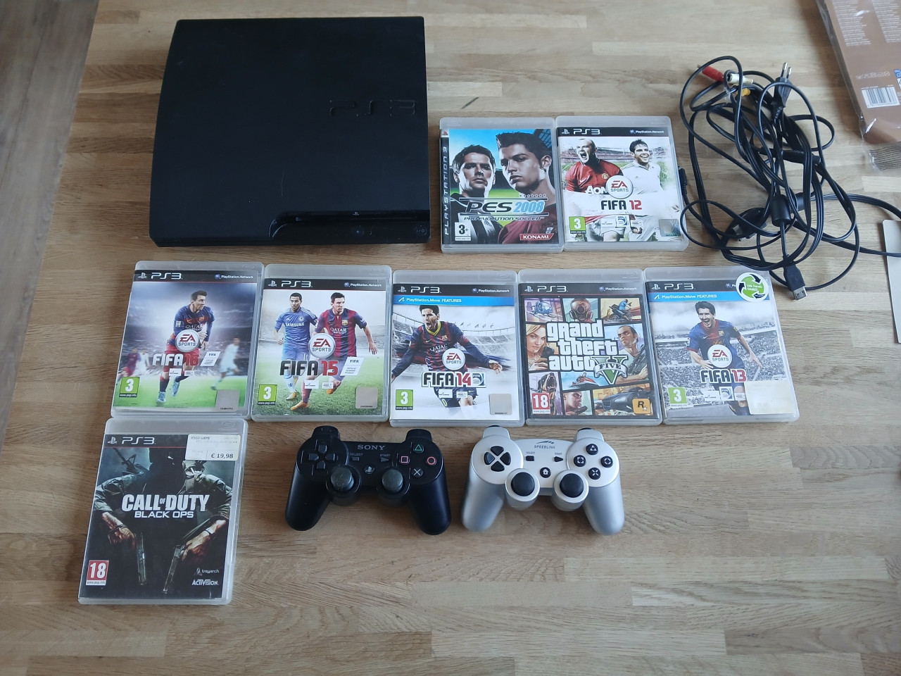 Playstation 3 met 2 controllers en 8 games