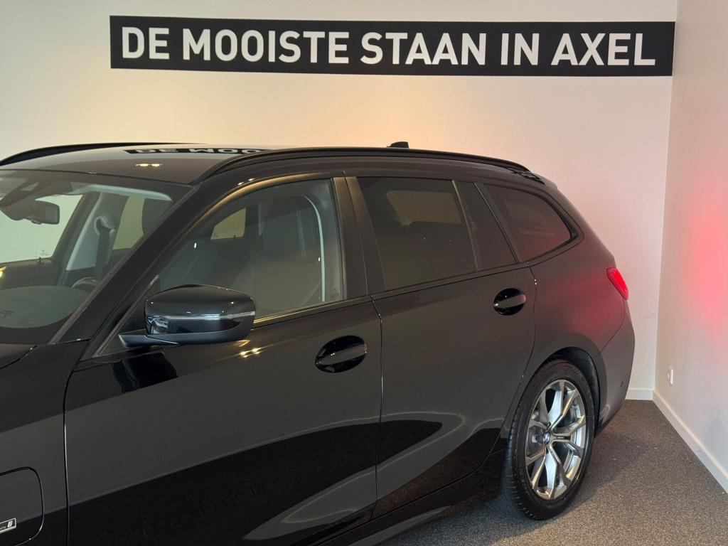 BMW 3-serie touring 320e high executive