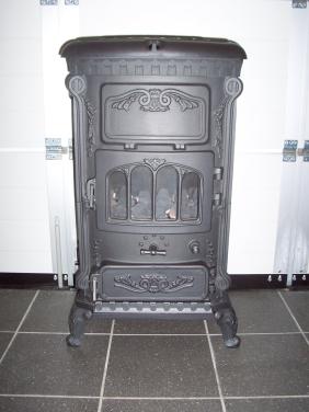 Te koop: Gietijzeren Gaskachel