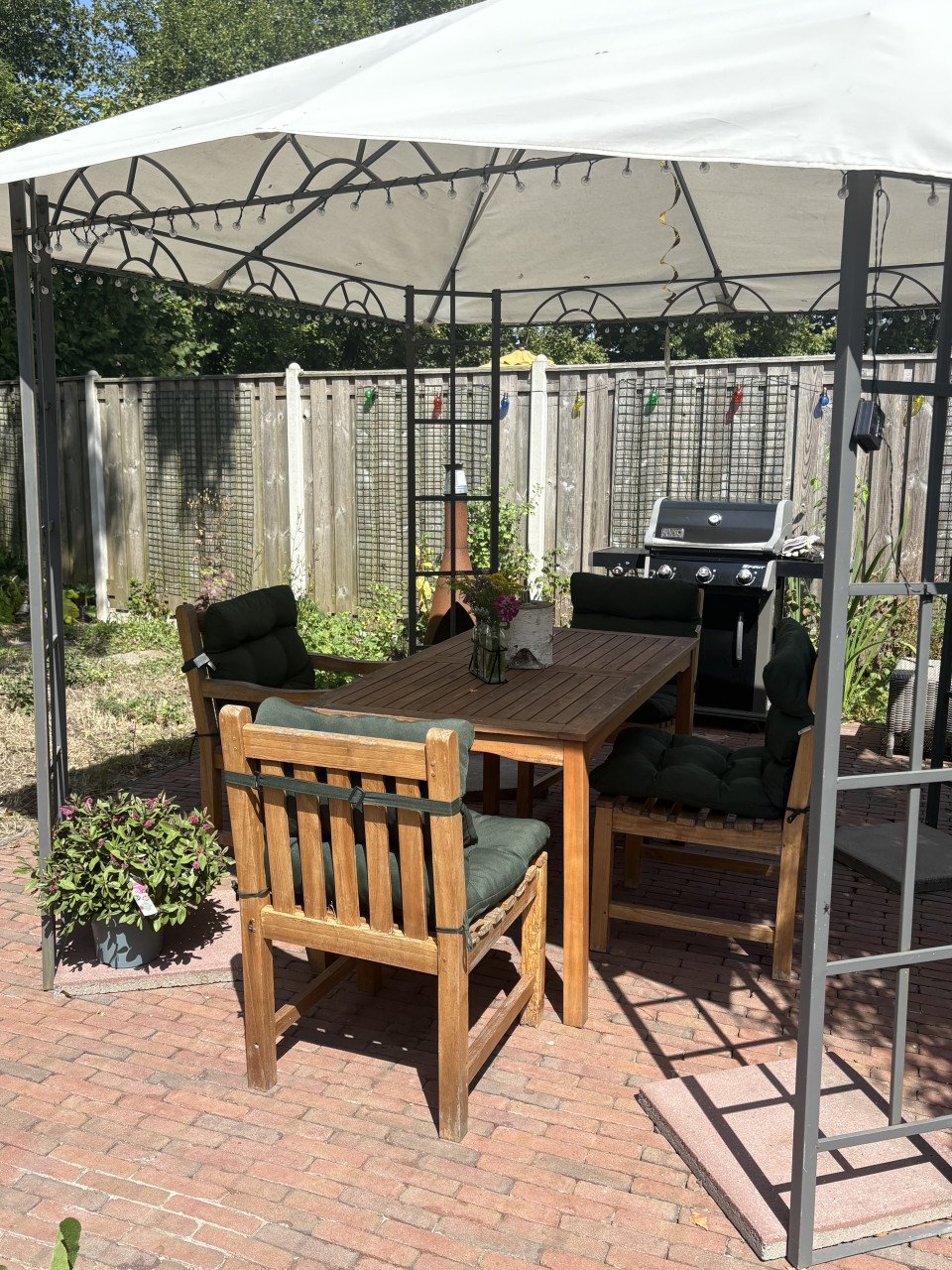 4 teakhouten tuinstoelen met kussens