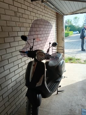 Te koop scooter blauw kenteken