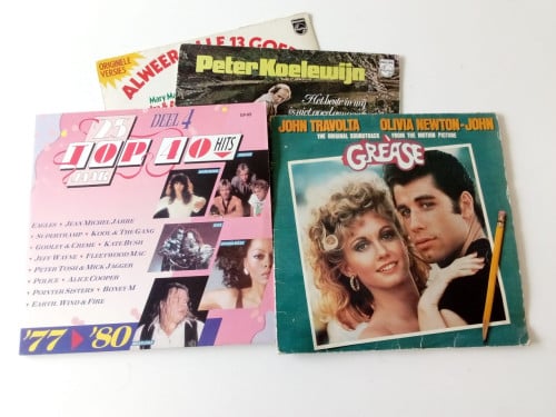 Set van 4 LP's o.a. Grease, Kate Bush, Meatloaf, Diana Ross, The Police