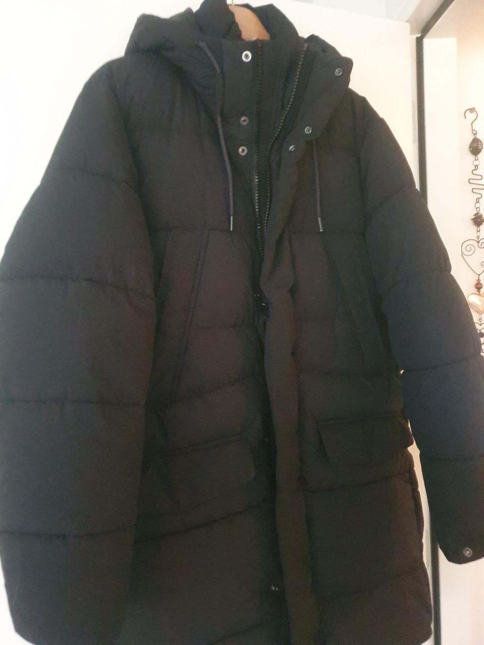 Mooie lange zwarte winterjas