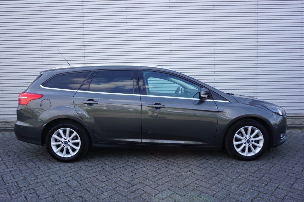 Ford Focus wagon 1.0 titanium climate / navi / stoelverw. / cruise / trekha