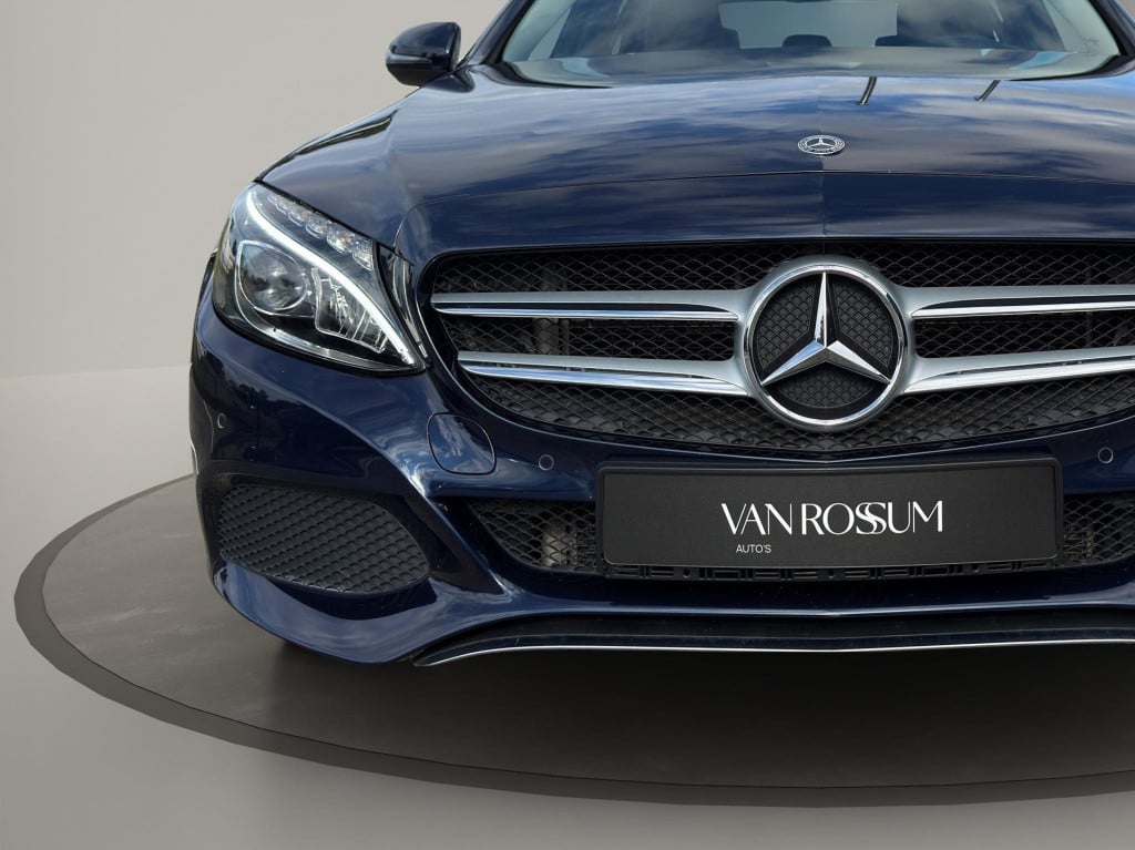 Mercedes-Benz C-Klasse c 180 business solution auto | navigatie | half lede