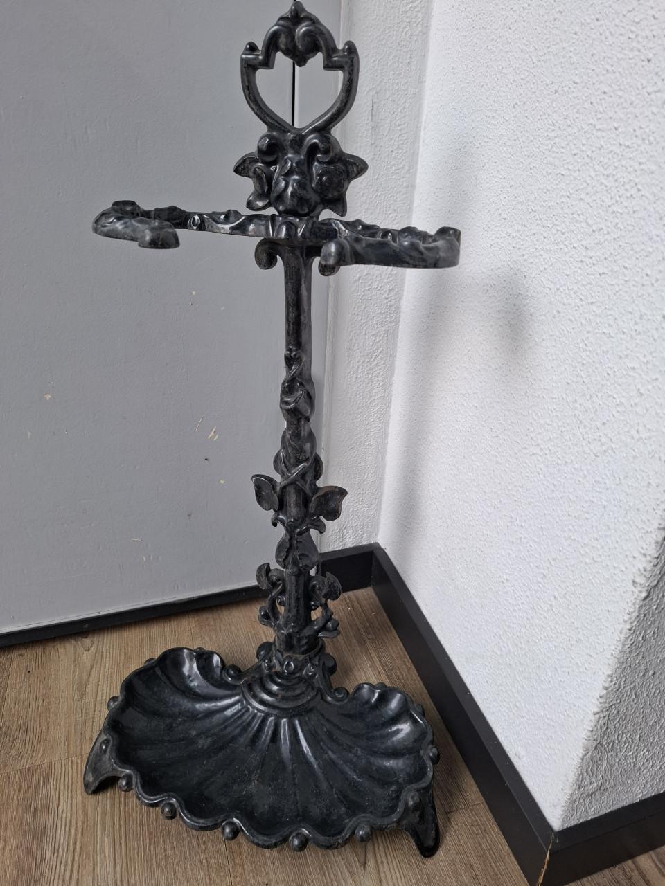 Antieke gietijzeren parapluhouder