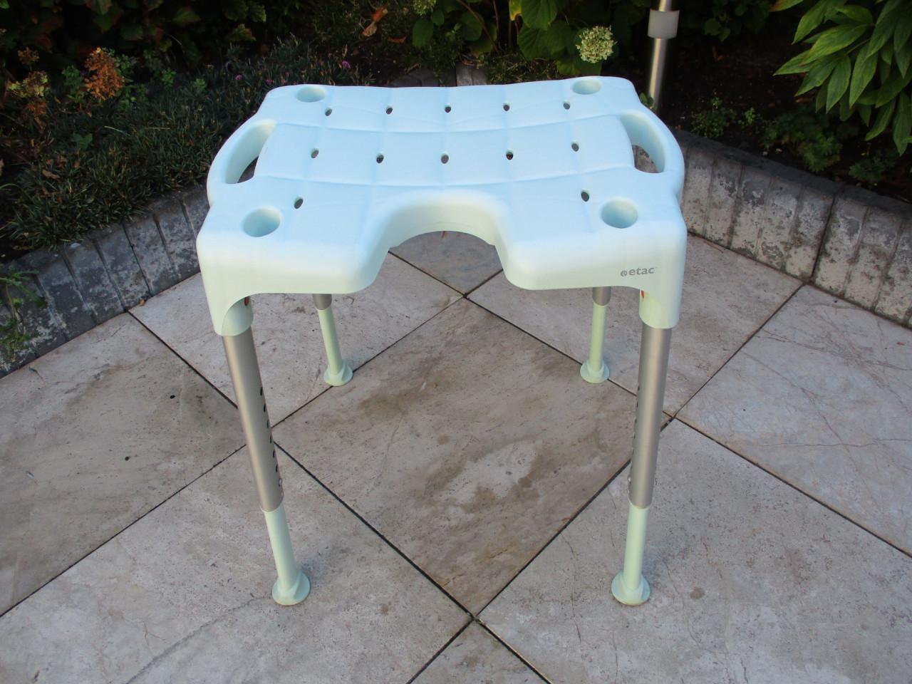 Zgan stevige Etac Swift douchestoel in hoogte instelbaar en demontabel