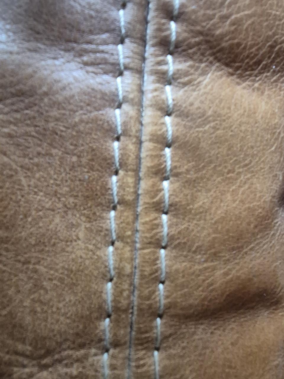 Lederen hoekbank incl hocker en 2 hoofdsteunrollen