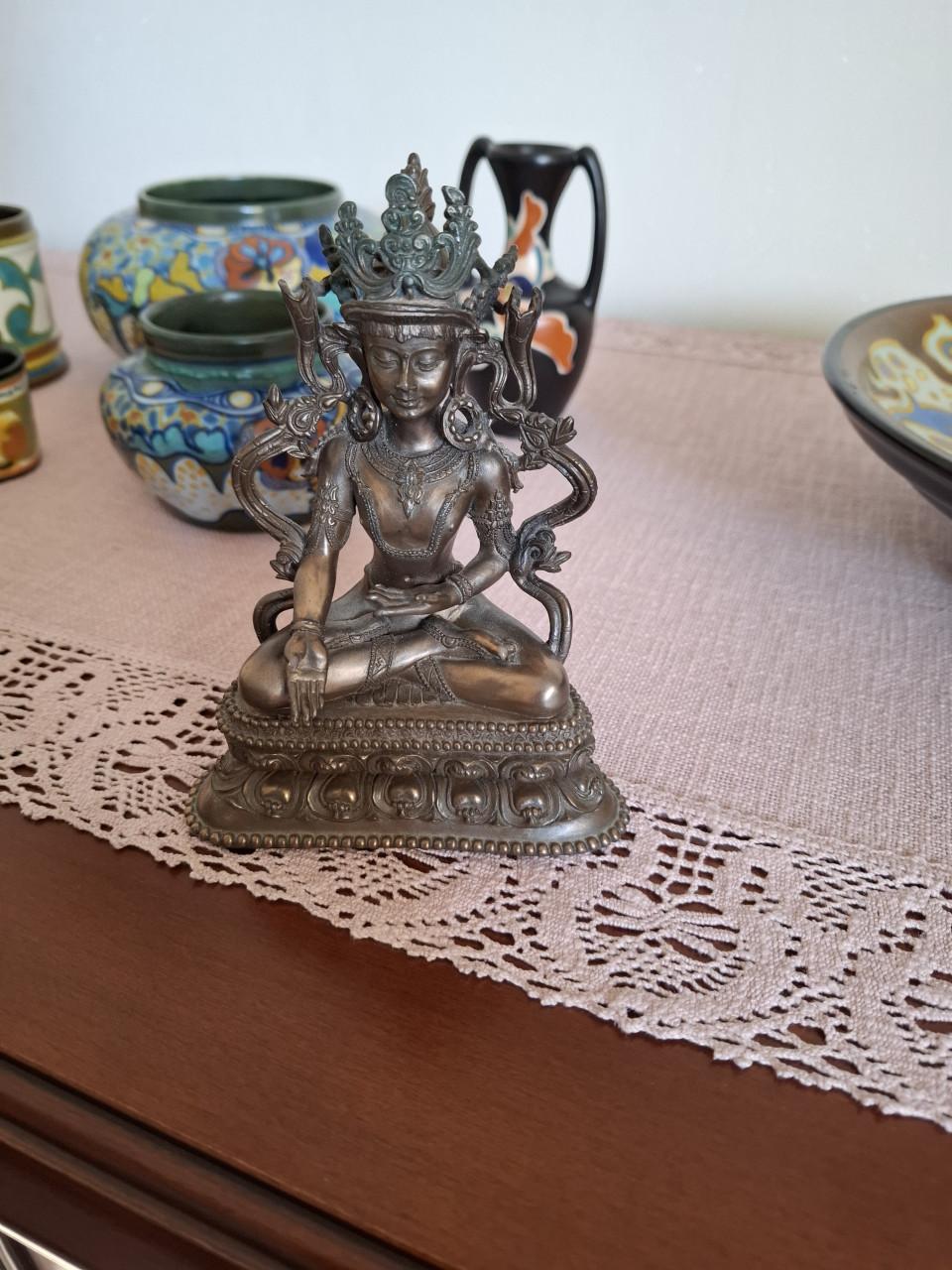Bronzen /metaal achtende Boedha beeltje