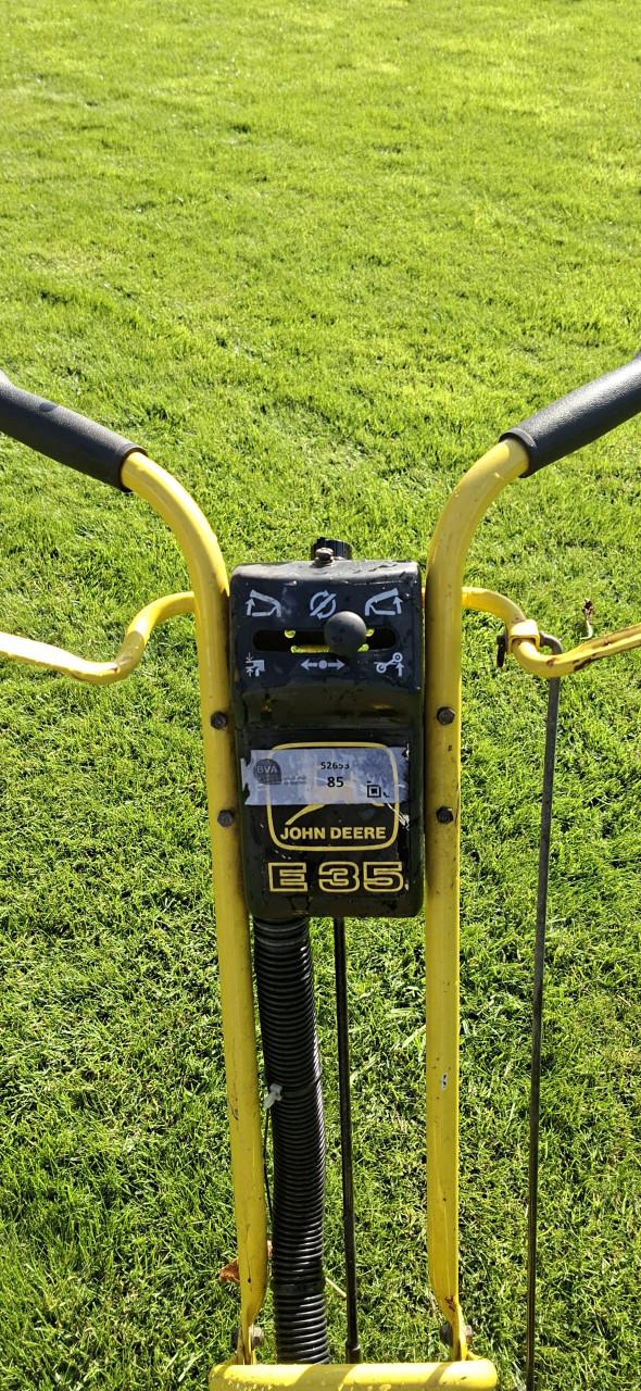 John Deere kantensnijder.