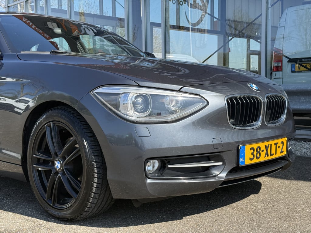 BMW 1 Serie 116i business sportline | nl-auto | groot navi | nieuwe distrib