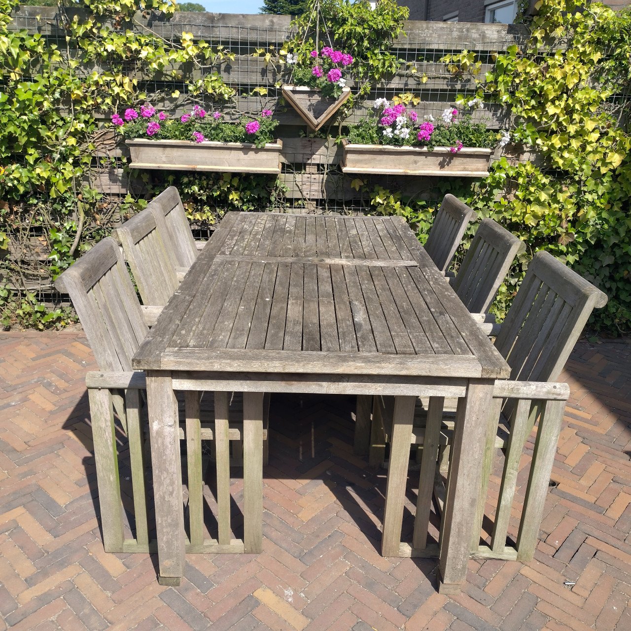 Houten tuinset 6 stoelen en tafel 1x2 meter