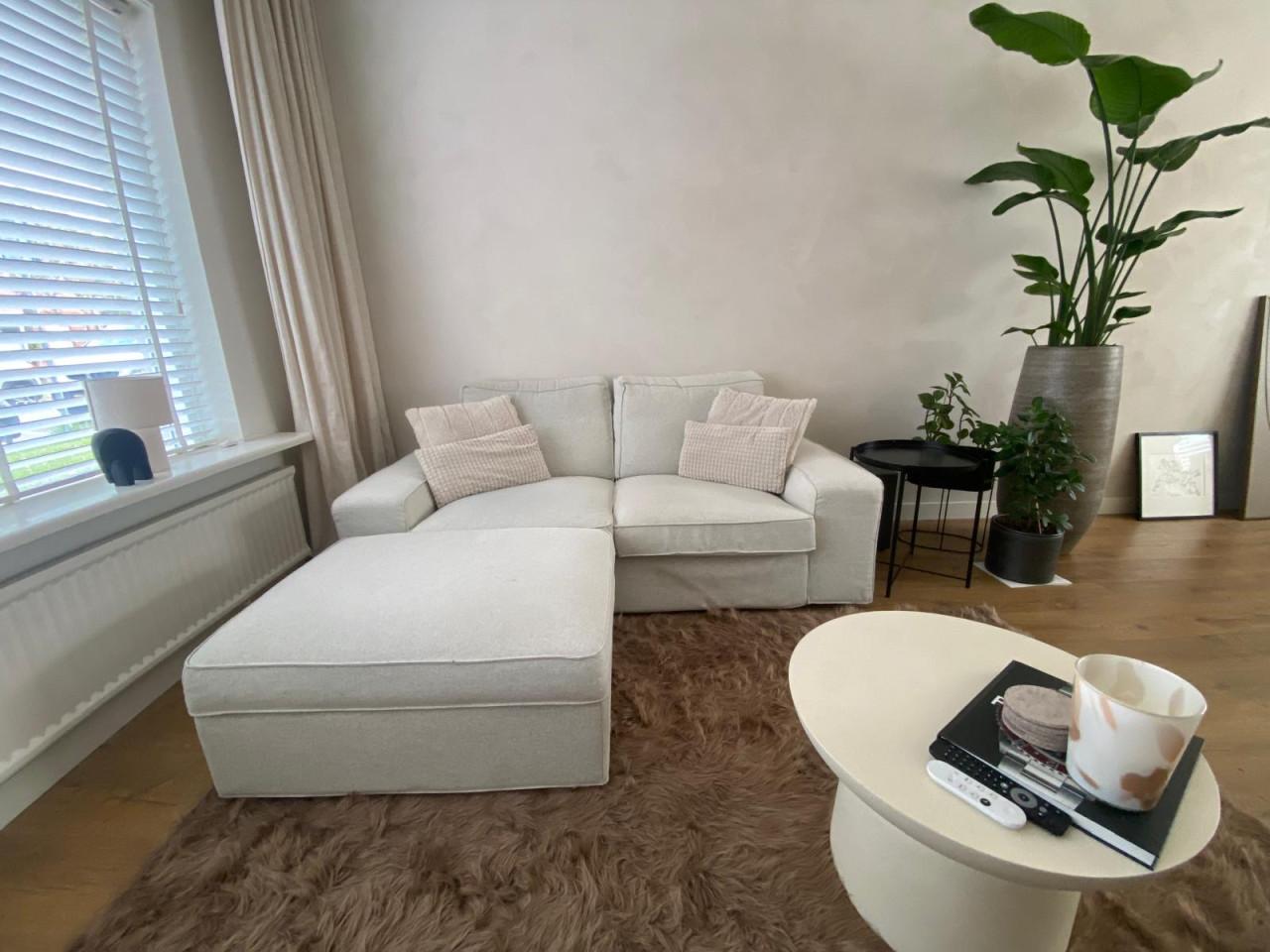 Beige Bank met Hooker