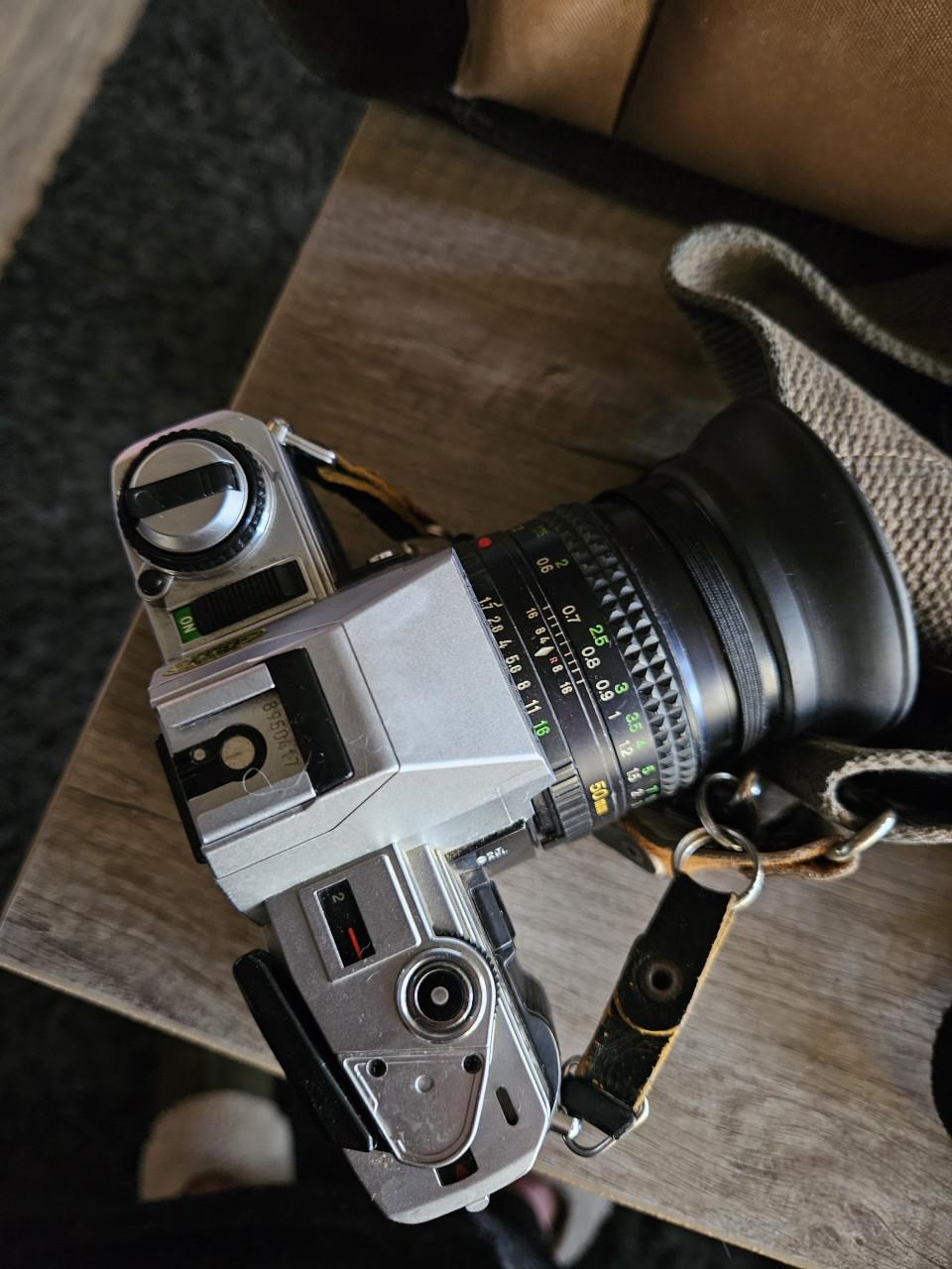 Vintage Minolta spiegelreflex camera X 300 met extra lenzen