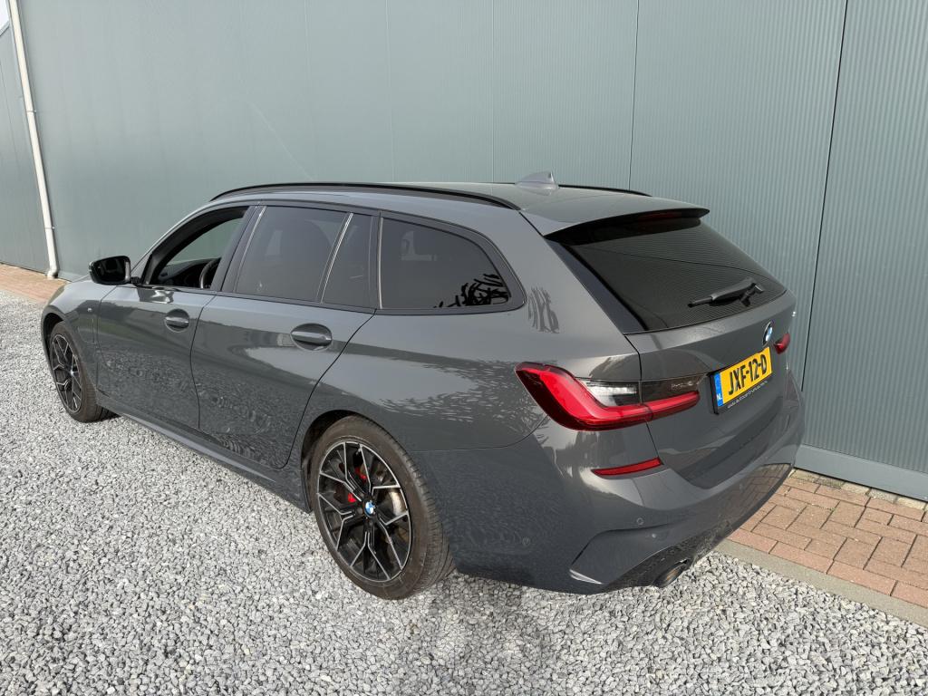 BMW 3-serie touring 330e automaat high executive m-sportpakket