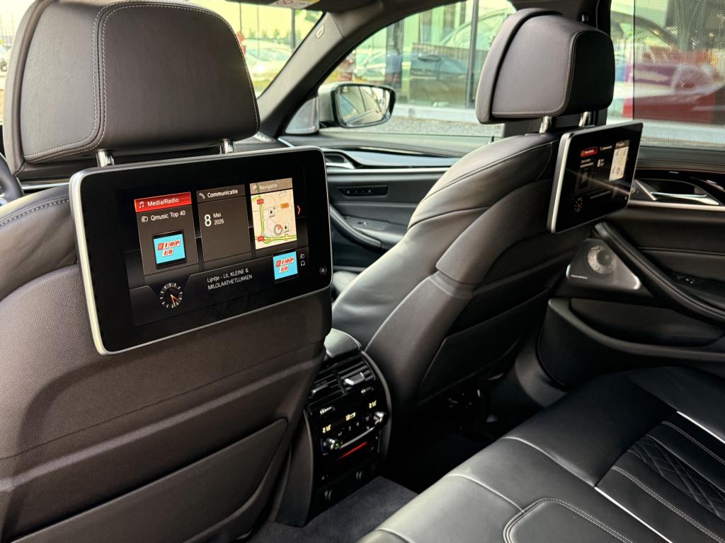 BMW 5 Serie m550i xdrive high executive | 4ws | soft-close | pano | b&w | m