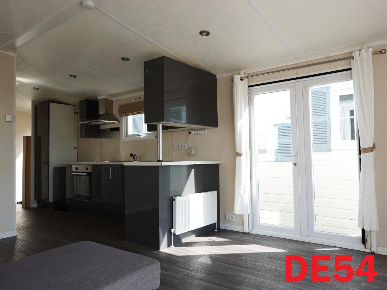 Keurig chalet met 2 slk, dubbel glas en centrale verwarming te koop!