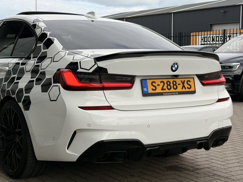 BMW 3-serie 320i m-sport | schuifdak | acc | leder | memory | laser | 20 in