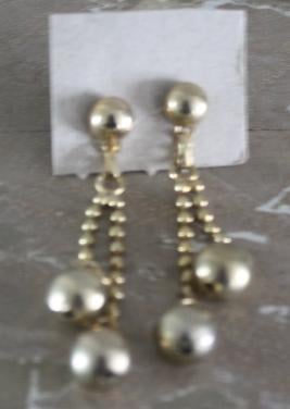 Goudkleurige oorstekers